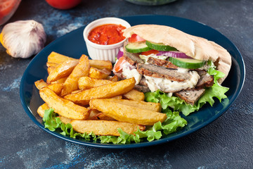 Doner kebab - fried minced meat  in pita bread