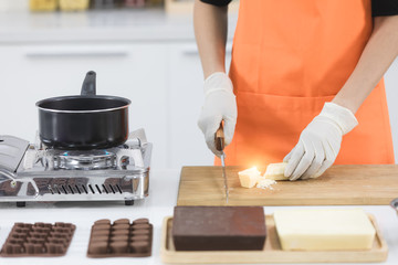 Woman making chocolate