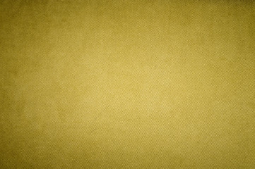 Textured background surface of textile upholstery furniture close-up. yellow Color fabric structure