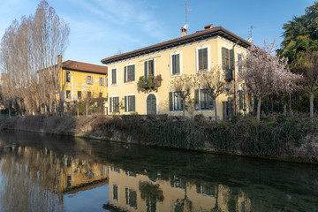 Fototapeta na wymiar Old buildings along the canal Martesana, Milan