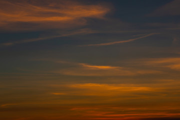 Obraz premium Twilight sky background. Colorful Sunset sky and cloud.vivid sky in twilight time background.Fiery orange sunset sky. Beautiful