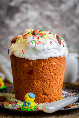 Easter cake with candied fruit, almonds and colored sprinkles.