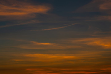 Naklejka na ściany i meble Twilight sky background. Colorful Sunset sky and cloud.vivid sky in twilight time background.Fiery orange sunset sky. Beautiful