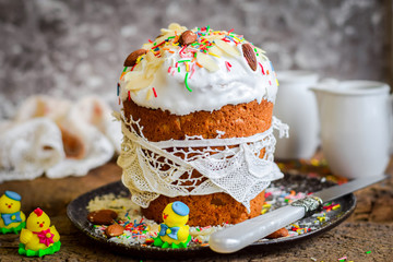 Easter cake with almonds and colored dressing.