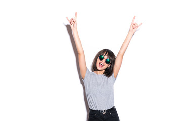 Crazy girl in t-shirt and rock sunglasses scream holding her head Rocky woman isolated on white...