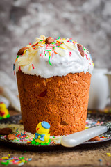 Easter cake with candied fruit, almonds and colored sprinkles.