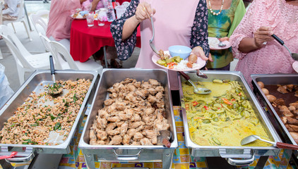 Food Buffet Catering Dining Eating Party Sharing Concept.people group catering buffet food indoor in luxury restaurant with meat colorful fruits and vegetables