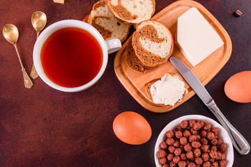 Tasty and useful breakfast with flakes, milk, nuts and dried fruits. The healthy food loading with energy