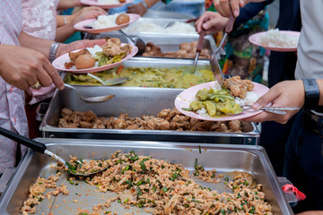 Food Buffet Catering Dining Eating Party Sharing Concept.people group catering buffet food indoor in luxury restaurant with meat colorful fruits and vegetables