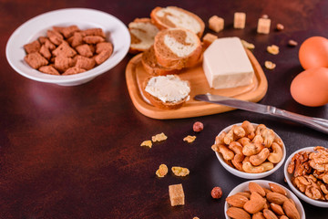 Tasty and useful breakfast with flakes, milk, nuts and dried fruits. The healthy food loading with energy