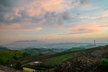 Golden sky with sea of mist in the morning and layer of mountain scene 