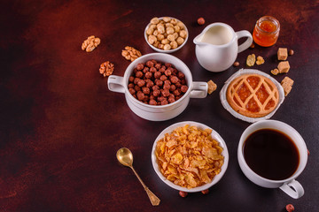 Tasty and useful breakfast with flakes, milk, nuts and dried fruits. The healthy food loading with energy