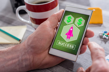 Success concept on a smartphone
