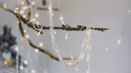 Defocused glowing garland bulbs, colorful christmas lights background. Celebration