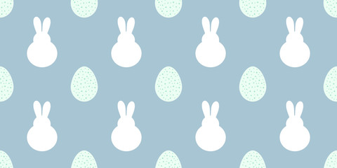 Easter bunnies and eggs samless blue pattern.