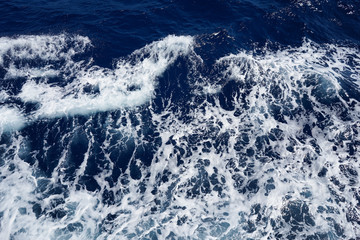 Aerial view to ocean waves.