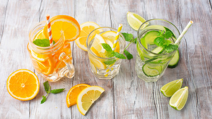 Infused water with fresh citrus fruits and ice