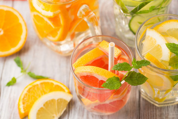 Fototapeta premium Infused water with fresh citrus fruits and ice