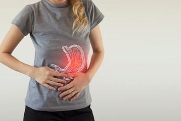  Digital composite of highlighted stomach of woman