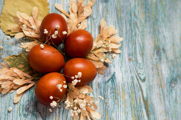 brown colored easter eggs close up, creative flat lay