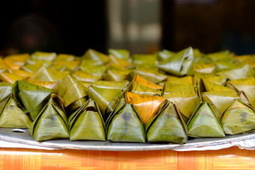 Thai dessert (Khanom Tien) wrapped in banana leaf