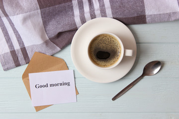  cup of coffee on wooden background top view. Good morning! Have a nice day