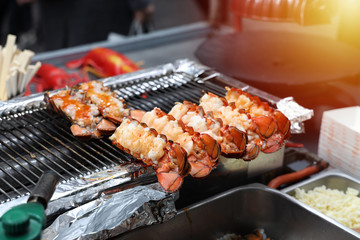 Close up Lobster burned on charcoal, street food in Seoul, South Korea