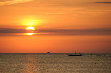 Fototapeta na wymiar Fishing farm silhouette at sunrise