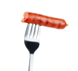 Delicious sausage on a fork, isolated on white background