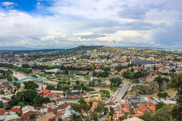 Fototapeta na wymiar Walking in Tbilisi. Top view of the capital of Georgia