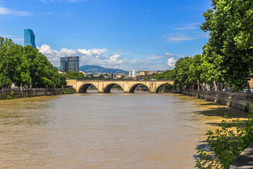 Naklejka premium Walking in Tbilisi. Bridges over the Kura river in the Georgian capital