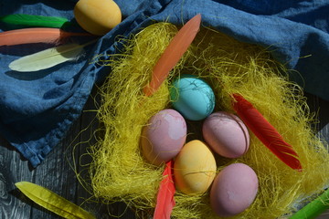 Easter eggs in pastel colors on the table