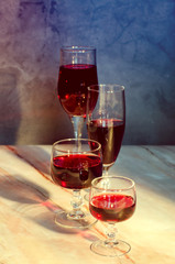 Wine card. Two goblets with red whine.