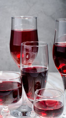 Wine card. Goblets with red and white whine.