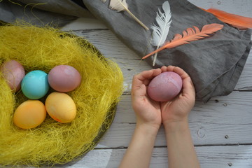 hand with easter eggs