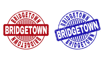 Grunge BRIDGETOWN round stamp seals isolated on a white background. Round seals with grunge texture in red and blue colors. Vector rubber imprint of BRIDGETOWN label inside circle form with stripes.