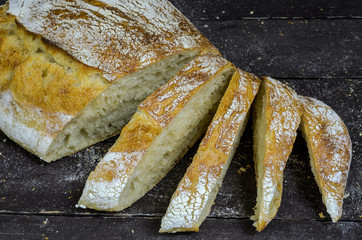 Freshly baked homemade bread on a wooden table