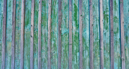 Cracked weathered blue and green shabby chic painted wooden board texture, front view