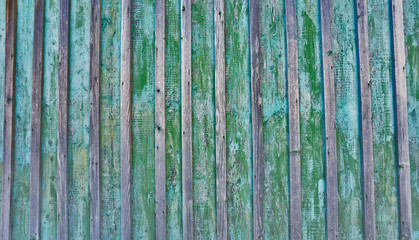 Cracked weathered blue and green shabby chic painted wooden board texture, front view