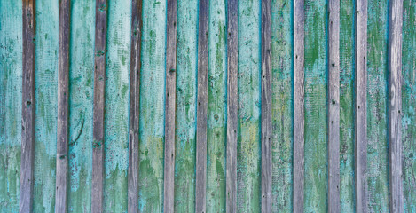Cracked weathered blue and green shabby chic painted wooden board texture, front view