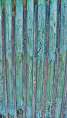 Cracked weathered blue and green shabby chic painted wooden board texture, front view