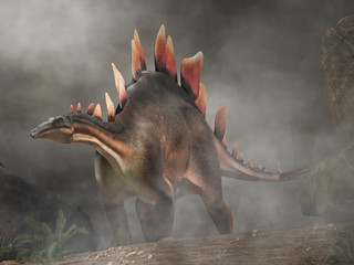 Stegosaurus, was a thyreophoran dinosaur. An herbivore, it is one of the best known dinosaurs of the Jurassic period. Here, a grey and brown one is standing among rock in the fog. 3D Rendering. 