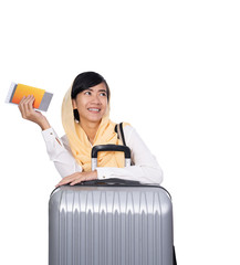 thinking asian muslim woman with suitcase and passport looking up to copyspace