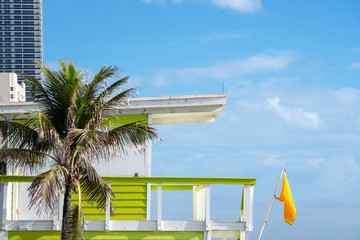 Yellow Flag on the Lifeguard chair at the Beach