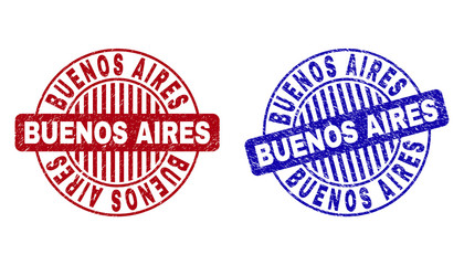 Grunge BUENOS AIRES round stamp seals isolated on a white background. Round seals with distress texture in red and blue colors.