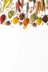 Fototapete Rund Set of indian spices in spoons on white © nadianb
