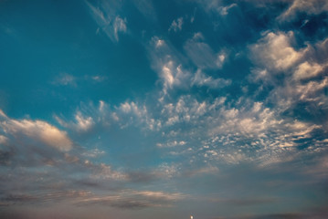 cloudscape with white altocumulus clouds at evening - obrazy, fototapety, plakaty