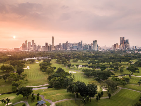 Panorama Aerial Drone Picture of the CBD Skyline of Manila, Philippines during Sunset