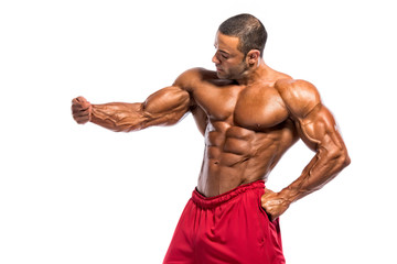 Fototapeta premium Body Builder Flexing Muscles