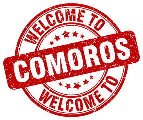 welcome to Comoros red round vintage stamp